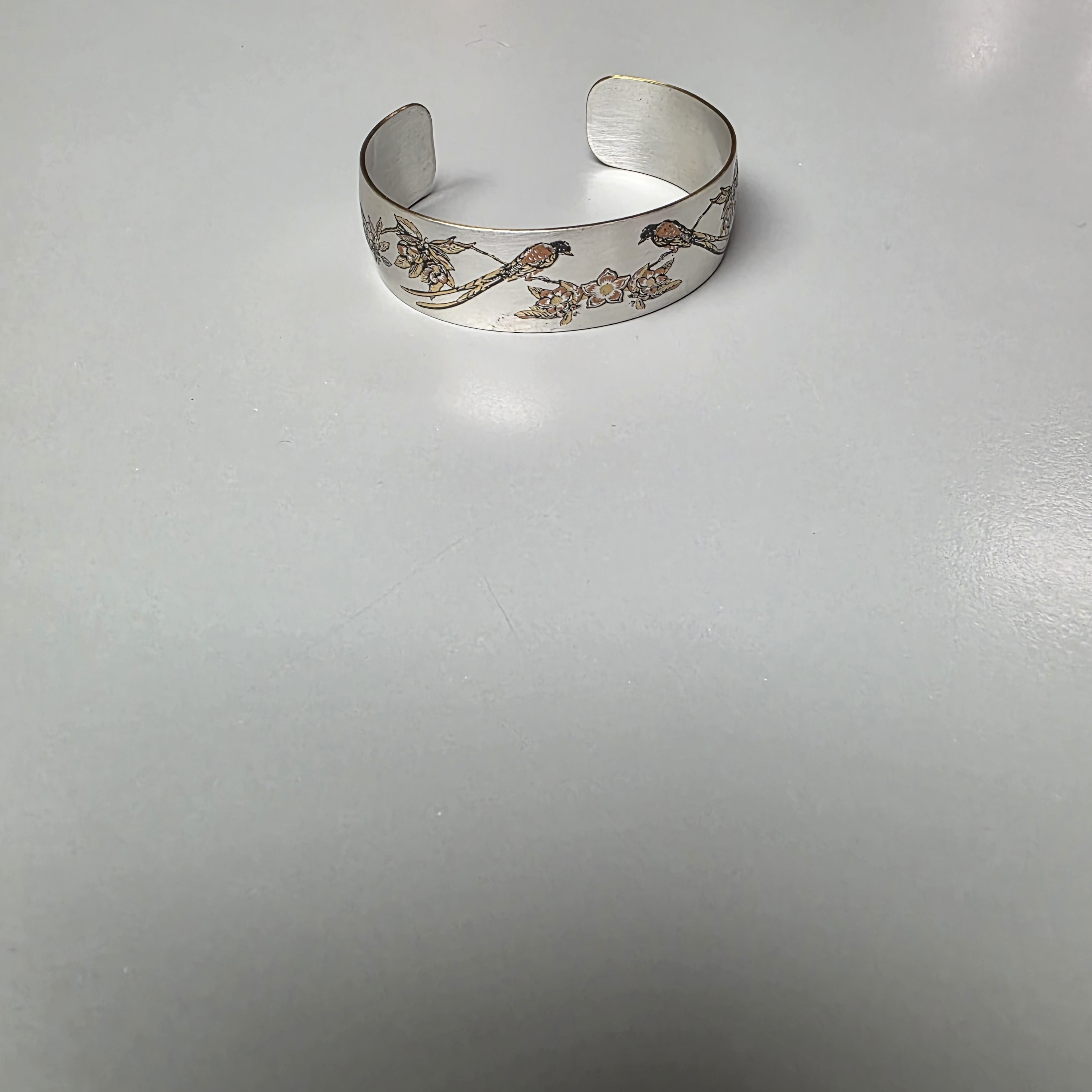 Elegant Silver And Gold Floral Cuff Bracelet